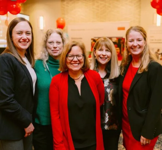public health social workers from BUSSW pose with Dean Jones