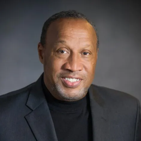 Headshot of Charles E Lewis